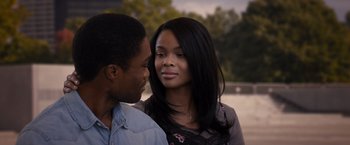 Movie still from “Acrimony” (2018), directed by Tyler Perry – A man and a woman standing next to each other; Close Up shot, Over the shoulder angle