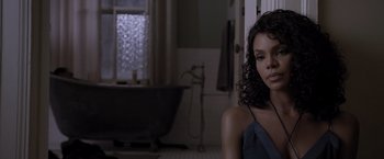 Movie still from “Acrimony” (2018), directed by Tyler Perry – A woman sitting in front of a bath tub in a bathroom; Close Up shot, Over the shoulder angle