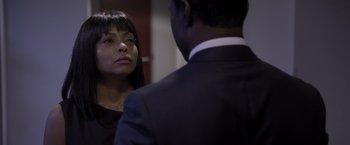Movie still from “Acrimony” (2018), directed by Tyler Perry – A man and a woman looking at one another in the mirror; Close Up shot, Over the shoulder angle