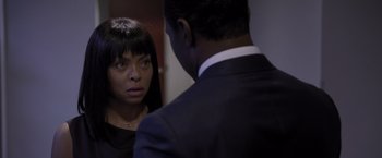 Movie still from “Acrimony” (2018), directed by Tyler Perry – A man and a woman looking at one another in the mirror; Close Up shot, Over the shoulder angle