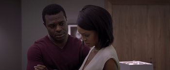 Movie still from “Acrimony” (2018), directed by Tyler Perry – A man and a woman looking down at each other; Close Up shot, Over the shoulder angle