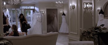 Movie still from “Acrimony” (2018), directed by Tyler Perry – A room filled with lots of furniture and a large mirror; Wide shot, Over the shoulder angle