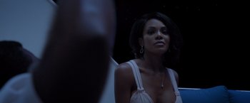 Movie still from “Acrimony” (2018), directed by Tyler Perry – A woman in a white top looking at a mirror; Close Up shot, Over the shoulder angle