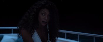 Movie still from “Acrimony” (2018), directed by Tyler Perry – A person with long curly black hair; Close Up shot, Over the shoulder angle