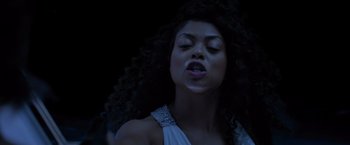 Movie still from “Acrimony” (2018), directed by Tyler Perry – A woman with long black curly hair and a white dress; Close Up shot, Low angle