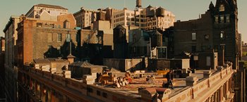 Movie still from “Across the Universe” (2007), directed by Julie Taymor – A view of a city from the roof of a building; Extreme Wide shot, High angle