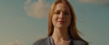 Movie still from “Across the Universe” (2007), directed by Julie Taymor – A beautiful young woman with long blonde hair; Close Up shot, Low angle