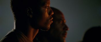 Movie still from “Act of Valor” (2012), directed by Scott Waugh – Two men looking into the distance in the dark; Close Up shot, Low angle