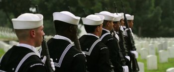 Movie still from “Act of Valor” (2012), directed by Scott Waugh – A group of men in navy uniforms holding guns; Wide shot, High angle