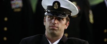 Movie still from “Act of Valor” (2012), directed by Scott Waugh – A person wearing a hat; Close Up shot, Low angle