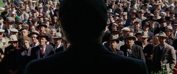 A group of people standing in front of each other
