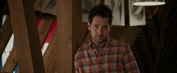 Movie still from “Admission” (2013), directed by Paul Weitz – A person wearing a plaid shirt; Close Up shot, Over the shoulder angle