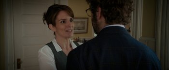 Movie still from “Admission” (2013), directed by Paul Weitz – A man and a woman talking to each other; Medium shot, Over the shoulder angle