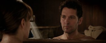 Movie still from “Admission” (2013), directed by Paul Weitz – A person sitting in a bathtub; Close Up shot, Over the shoulder angle