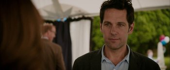 Movie still from “Admission” (2013), directed by Paul Weitz – A man standing in front of another man; Close Up shot, Over the shoulder angle