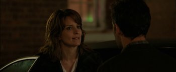Movie still from “Admission” (2013), directed by Paul Weitz – A woman and a man are talking to each other; Close Up shot, Over the shoulder angle