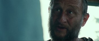 Movie still from “Adoration” (2019), directed by Fabrice du Welz – A person with a beard; Close Up shot, Over the shoulder angle