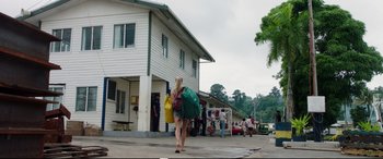 Movie still from “Adrift” (2018), directed by Baltasar Kormákur – A woman walking down a street with a backpack; Wide shot, Over the shoulder angle