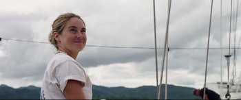 Movie still from “Adrift” (2018), directed by Baltasar Kormákur – A woman standing on a boat in the water; Close Up shot, Low angle