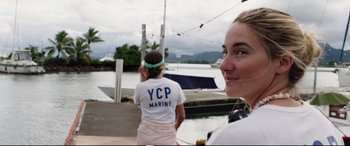 Movie still from “Adrift” (2018), directed by Baltasar Kormákur – Two women standing next to a body of water; Close Up shot, Over the shoulder angle