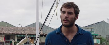 Movie still from “Adrift” (2018), directed by Baltasar Kormákur – A person wearing a blue shirt; Close Up shot, Over the shoulder angle