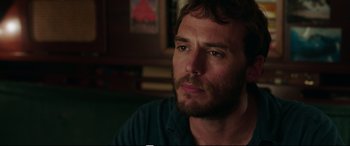 Movie still from “Adrift” (2018), directed by Baltasar Kormákur – A person sitting in a room; Close Up shot, Over the shoulder angle