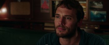 Movie still from “Adrift” (2018), directed by Baltasar Kormákur – A person sitting in a room; Close Up shot, Over the shoulder angle