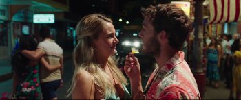 Movie still from “Adrift” (2018), directed by Baltasar Kormákur – A man and a woman sharing a bite of food; Close Up shot, Over the shoulder angle