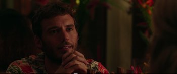 Movie still from “Adrift” (2018), directed by Baltasar Kormákur – A person with his hand on his chin; Close Up shot, Over the shoulder angle