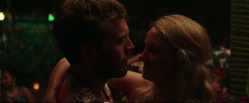 Movie still from “Adrift” (2018), directed by Baltasar Kormákur – A man and a woman kissing in a dark room; Close Up shot, Over the shoulder angle