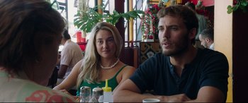 Movie still from “Adrift” (2018), directed by Baltasar Kormákur – A man and a woman sitting at a table in a restaurant; Close Up shot, Over the shoulder angle