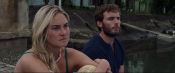 Movie still from “Adrift” (2018), directed by Baltasar Kormákur – A man and a woman sitting next to each other; Close Up shot, High angle