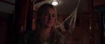 Movie still from “Adrift” (2018), directed by Baltasar Kormákur – A woman with long blonde hair wearing a necklace; Close Up shot, Over the shoulder angle