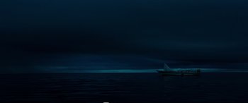 Movie still from “Adrift” (2018), directed by Baltasar Kormákur – A sailboat in the ocean under a cloudy sky; Extreme Wide shot, Low angle