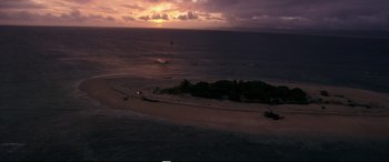Movie still from “Adrift” (2018), directed by Baltasar Kormákur – An aerial view of the ocean at sunset; Extreme Wide shot, High angle