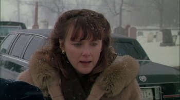 Movie still from “Affliction” (1997), directed by Paul Schrader – A person wearing a fur coat; Close Up shot, Over the shoulder angle