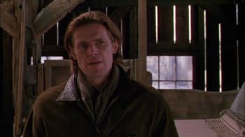 Movie still from “Affliction” (1997), directed by Paul Schrader – A person wearing a jacket; Close Up shot, Over the shoulder angle