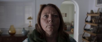 Movie still from “After Love” (2020), directed by Aleem Khan – A person with her eyes wide open; Close Up shot, Low angle