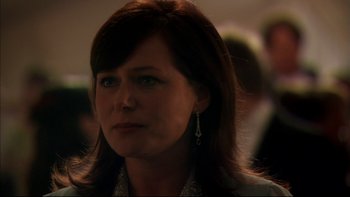 Movie still from “After the Wedding” (2006), directed by Susanne Bier – A person with long hair; Close Up shot, Over the shoulder angle