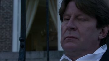 Movie still from “After the Wedding” (2006), directed by Susanne Bier – A person with his eyes closed; Close Up shot, Low angle