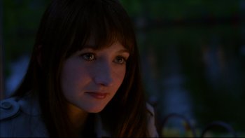 Movie still from “After the Wedding” (2006), directed by Susanne Bier – A person with long hair; Close Up shot, Over the shoulder angle