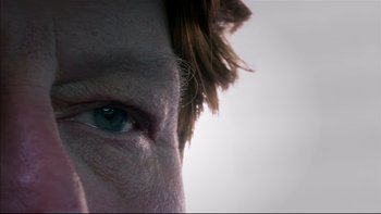 Movie still from “After the Wedding” (2006), directed by Susanne Bier – View of a man's blue eyes; Extreme Close Up shot, Low angle