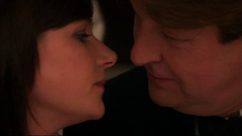 Movie still from “After the Wedding” (2006), directed by Susanne Bier – A man and a woman face to face in the dark; Extreme Close Up shot, Over the shoulder angle