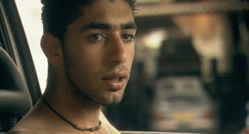 A person wearing a necklace