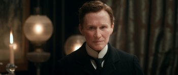 Movie still from “Albert Nobbs” (2011), directed by Rodrigo García – A person wearing a suit and tie; Close Up shot, High angle