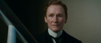 Movie still from “Albert Nobbs” (2011), directed by Rodrigo García – A person wearing a suit and tie; Close Up shot, High angle