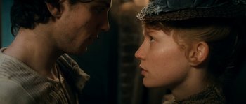 Movie still from “Albert Nobbs” (2011), directed by Rodrigo García – A man and a woman face to face in front of each other; Close Up shot, Over the shoulder angle