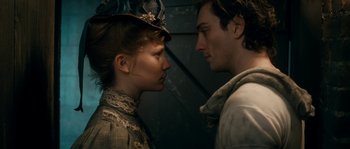 Movie still from “Albert Nobbs” (2011), directed by Rodrigo García – A man and a woman standing next to each other; Close Up shot, Low angle