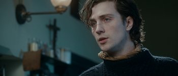 Movie still from “Albert Nobbs” (2011), directed by Rodrigo García – A person wearing a sweater; Close Up shot, Over the shoulder angle