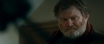 Movie still from “Albert Nobbs” (2011), directed by Rodrigo García – An old man with a beard and a mustache; Close Up shot, Over the shoulder angle